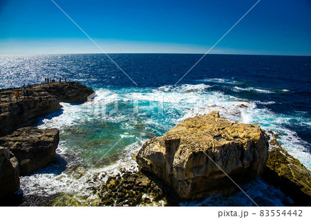 Rocky coastline cliffs near collapsed Azure window, Gozo island, Malta Rocky coastline cliffs near collapsed Azure window, Gozo island, Malta 83554442