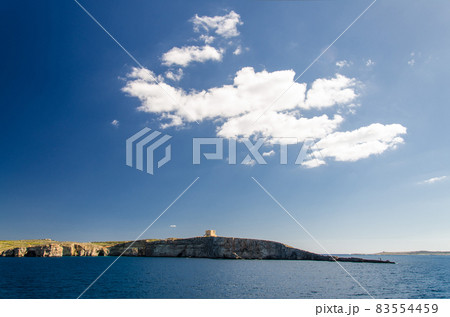 Tower bastioned on island Comino in Mediterranean Sea, Malta 83554459