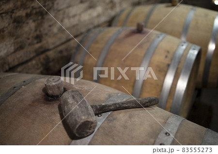 Wooden oak barrels in a winery nearby Batorove Kosihy, Slovakia Wooden oak barrels in a winery nearby Batorove Kosihy, Slovakia 83555273
