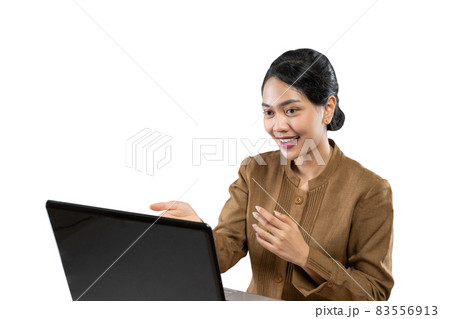 Smiling woman in civil servant uniform using laptop to work Smiling woman in civil servant uniform using laptop to work 83556913