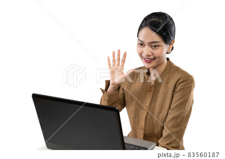 Smiling woman in civil servant uniform using laptop to work Smiling woman in civil servant uniform using laptop to work 83560187