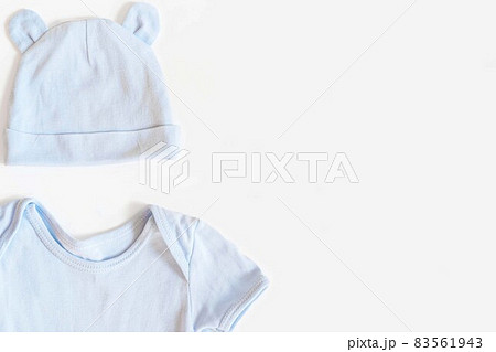 Newborn baby clothing on white background,Top view, flat lay, space for text. Newborn baby clothing on white background,Top view, flat lay, space for text. 83561943