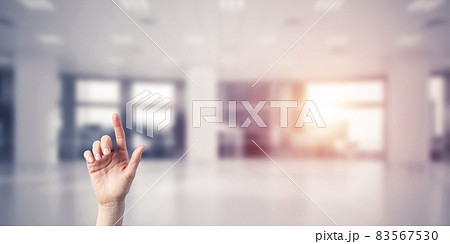 Choosing gesture of person in elegant modern interior in sunshine light Choosing gesture of person in elegant modern interior in sunshine light 83567530