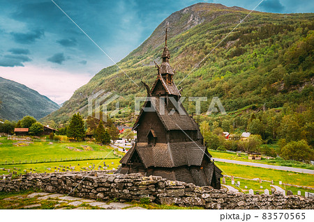 Borgund, Norway. Famous Landmark Stavkirke An Old Wooden Triple Nave Stave Church In Summer Day. Ancient Old Wooden Worship In Norwegian Countryside Landscape 83570565
