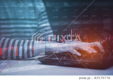 Asian young man interacting with laptops, phones, and tablets with featuring stock tickers or graphs, cryptocurrency and new trading platforms, ideas and perspectives, Stock investment,New technology 83570776