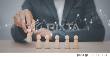 Man hand touch wooden Human resources officer looking for leader and CEO concept, Leader leave his comfort zone and get out of the crowd. Personal development, motivation and challenge. Man hand touch wooden Human resources officer looking for leader and CEO concept, Leader leave his comfort zone and get out of the crowd. Personal development, motivation and challenge. 83570794