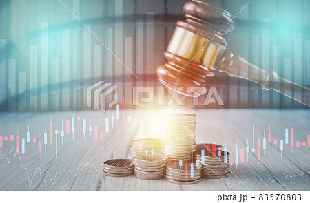 Old wood Judge hammer with stacking coins in close-up and coins stack the table wood background, Used for adjudication and Justice. Old wood Judge hammer with stacking coins in close-up and coins stack the table wood background, Used for adjudication and Justice. 83570803