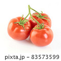 Ripe red tomatoes on white 83573599