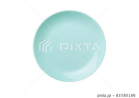 Blue ceramic round plate isolated over white background. Top view 83580186