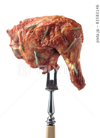 Grilled chicken leg with rosemary isolated on a white background. 83583146