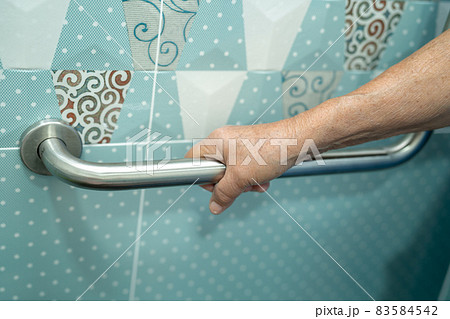 Asian senior or elderly old lady woman patient use toilet bathroom handle security in nursing hospital ward, healthy strong medical concept. 83584542