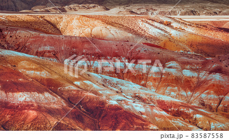 Red mountains of Altai region. Close-up of the rock Red mountains of Altai region. Close-up of the rock 83587558