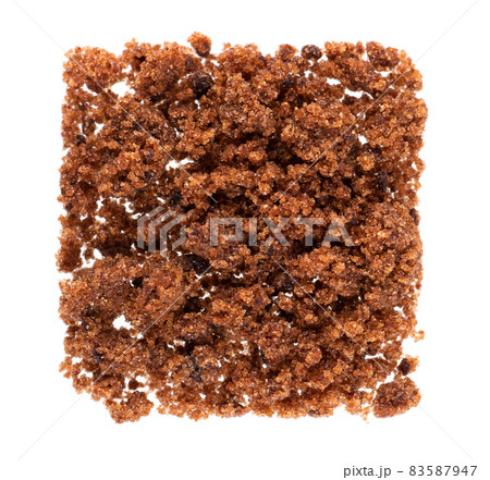 Muscovado sugar isolated on white background. Barbados sugar, khandsari or khand. Top view. 83587947