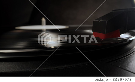 Amazing view over a record player playing a vinyl 83597978