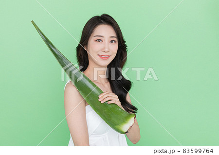 skin beauty concept, beautiful Korean Asian woman holding aloe skin beauty concept, beautiful Korean Asian woman holding aloe 83599764