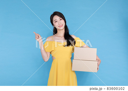 shopping event concept, beautiful Korean Asian woman with delivery box shopping event concept, beautiful Korean Asian woman with delivery box 83600102