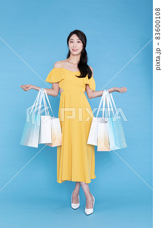 shopping event concept, beautiful Korean Asian woman with shopping bag 83600108