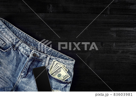 Cash and smart in your jeans pocket. Still life. 83603981