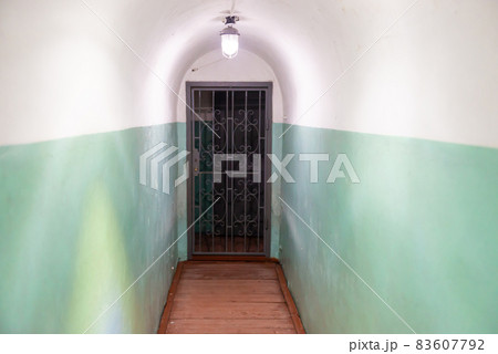 Corridor passage with door and lights 83607792