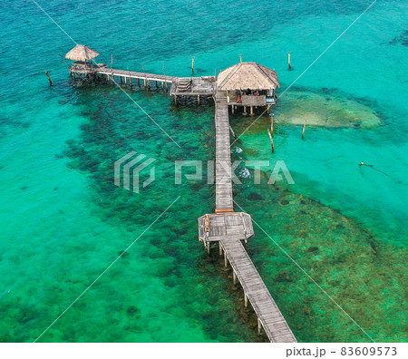 Wooden beach bar in sea and hut on pier in koh Mak island, Trat, Thailand 83609573