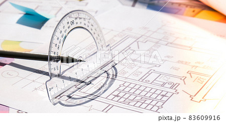 A pencil with a protractor. Architectural Project drawings with tools. Architects workplace. Engineering Interior designer's working table A pencil with a protractor. Architectural Project drawings with tools. Architects workplace. Engineering Interior designer's working table 83609916