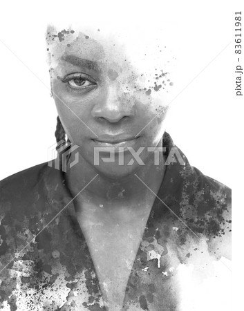 A full face portrait of a young woman combined with watercolor splashes. Paintography. 83611981