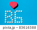 B 6 vitamin pills on a blue background, special treatment for people on diet. 83616388
