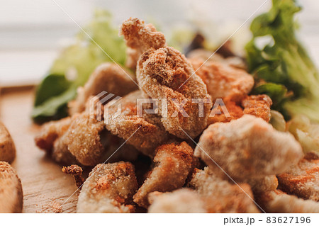Close up of homemade Chicken Karaage in wooden plate. 83627196