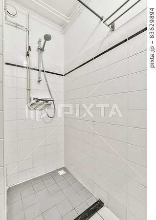Modern shower stall in a bright bathroom 83629894