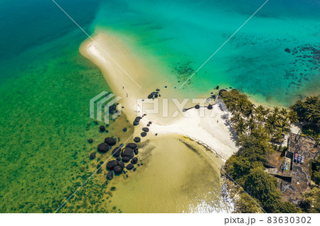 Beautiful tropical island koh Kham, white sand beach with volcanic rocks, near koh Mak, Trat Beautiful tropical island koh Kham, white sand beach with volcanic rocks, near koh Mak, Trat 83630302