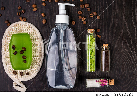 soaps, bath salt, mask on wood table background. spa soaps, bath salt, mask on wood table background. spa 83633539