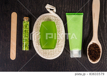 soaps, bath salt, mask on wood table background. spa soaps, bath salt, mask on wood table background. spa 83633579