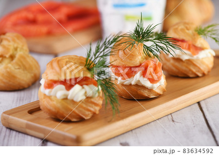 Profiteroles with salmon Profiteroles with salmon 83634592