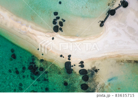 Beautiful tropical island koh Kham, white sand beach with volcanic rocks, near koh Mak, Trat Beautiful tropical island koh Kham, white sand beach with volcanic rocks, near koh Mak, Trat 83635715