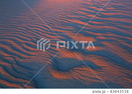 Wavy and narrow patterns in the sand before dawn Wavy and narrow patterns in the sand before dawn 83643516