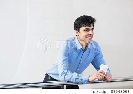 close-up portrait of a man with coffee close-up portrait of a man with coffee 83648063