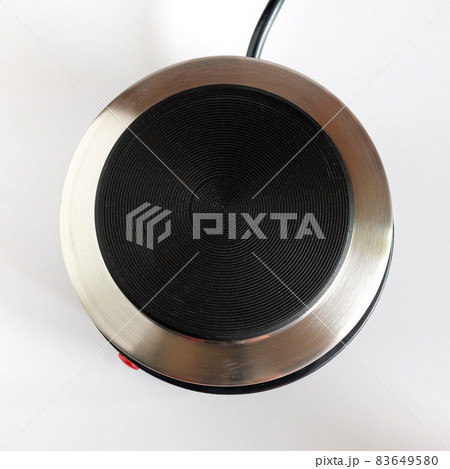Top vew of Electric stainless steel stove or multi funtional coffee stove. Top vew of Electric stainless steel stove or multi funtional coffee stove. 83649580