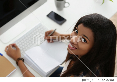 Beautiful latinoamerican secretary in place 83650788