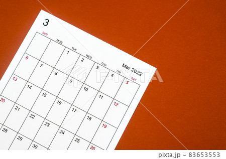 March 2022 calendar sheet on red background. March 2022 calendar sheet on red background. 83653553