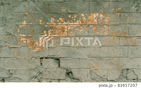 Grunge paternal walls of the old building. color on the outer wall of building. Old building with falling off plaster. Background of brick wall pattern Grunge paternal walls of the old building. color on the outer wall of building. Old building with falling off plaster. Background of brick wall pattern 83657207
