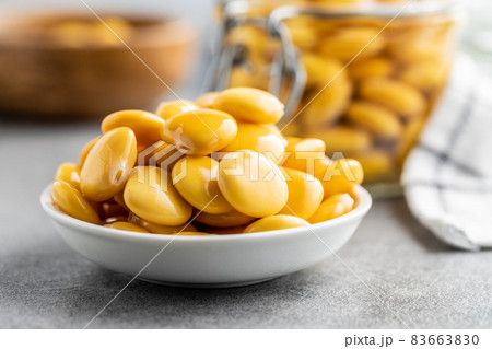 Pickled yellow Lupin Beans in bowl 83663830