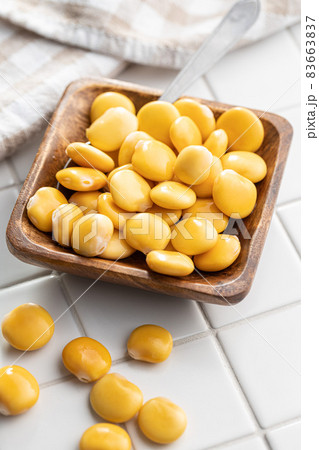 Pickled yellow Lupin Beans in bowl 83663837