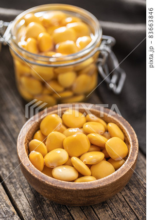 Pickled yellow Lupin Beans in bowl 83663846
