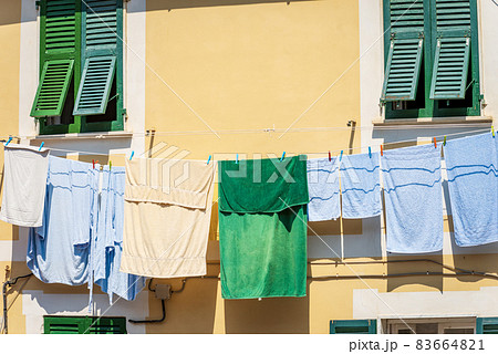 Towels Hanging out to dry on a Clothesline in Liguria Italy Towels Hanging out to dry on a Clothesline in Liguria Italy 83664821