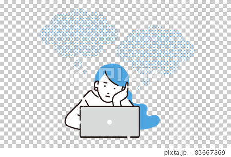 A woman who is depressed looking at a personal computer 83667869