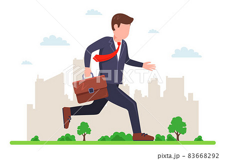 a man in a business suit runs down the street to work. 83668292