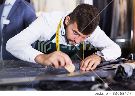 guy snipper in modern workshop 83668477