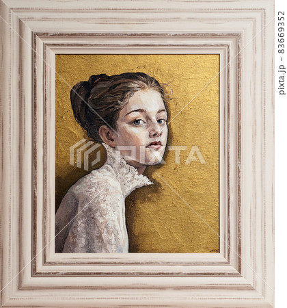 Framed oil painting. Portrait of a girl on a gold background.  83669352
