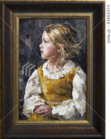Framed portrait of young girl, on a gray-blue cold background. 83669354