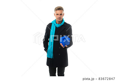 The best gift is hand-picked. Serious man hold gift box. Present giving. Boxing day 83672847